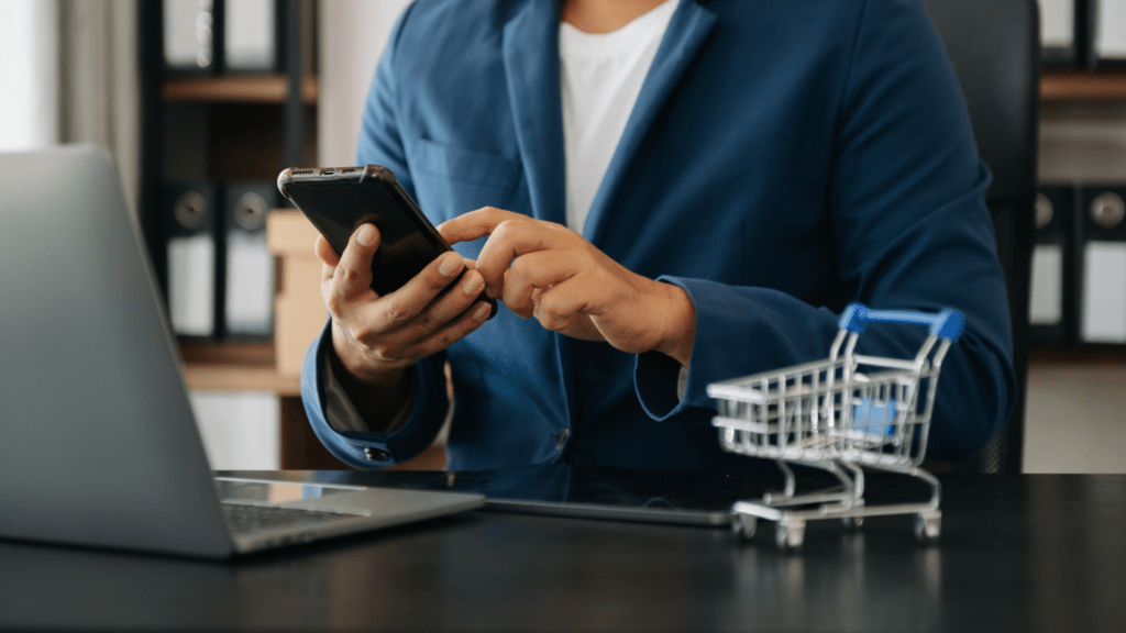 woman holding phone shopping