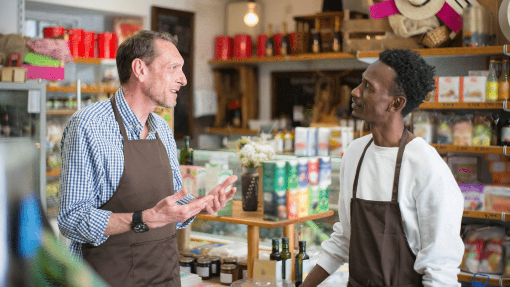 men talking at store